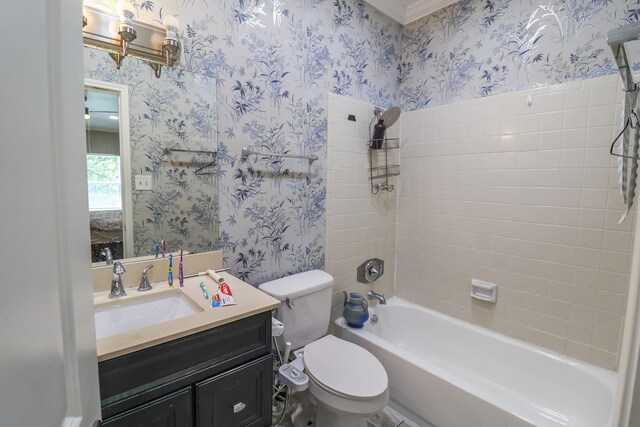 7264 Regency Square Ct, Houston, TX 77036 - bathroom featuring wallpapered walls, vanity, and bathing tub / shower combination