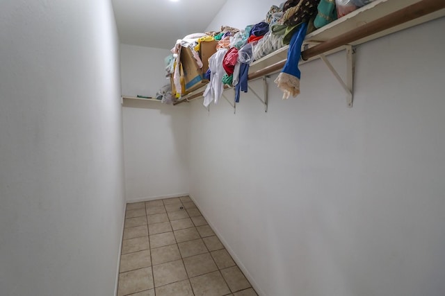 7264 Regency Square Ct, Houston, TX 77036 - walk in closet with tile patterned flooring