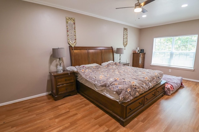 7264 Regency Square Ct, Houston, TX 77036 - bedroom with light wood finished floors, recessed lighting, crown molding, and ceiling fan