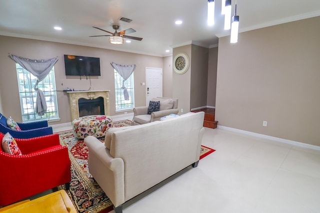 7264 Regency Square Ct, Houston, TX 77036 - living area with crown molding, a ceiling fan, recessed lighting, and a high end fireplace