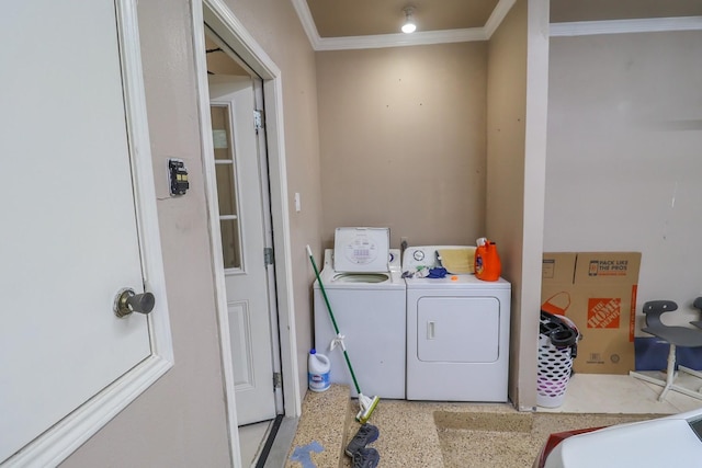 7264 Regency Square Ct, Houston, TX 77036 - laundry room with washer and clothes dryer and ornamental molding