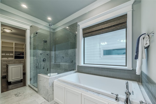 326 W 24th St, Houston, TX 77008 - bathroom with a bath, a shower stall, marble finish flooring, a walk in closet, and recessed lighting