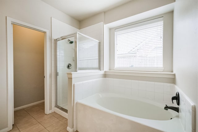 3817 Dunlavy Dr, Pearland, TX 77581 - full bath featuring a bath, a shower stall, and tile patterned flooring