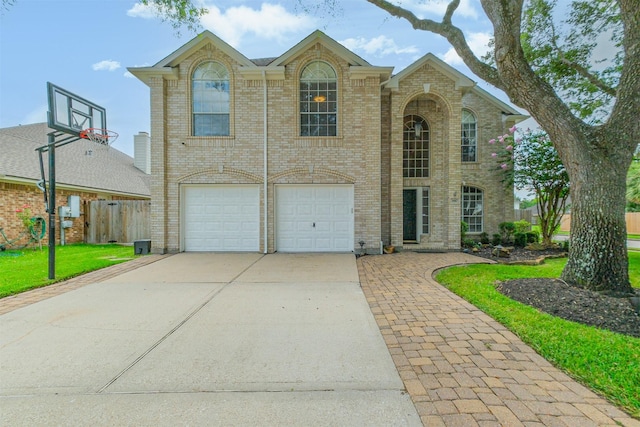 3817 Dunlavy Dr, Pearland, TX 77581 - view of front of house with brick siding, concrete driveway, and an attached garage
