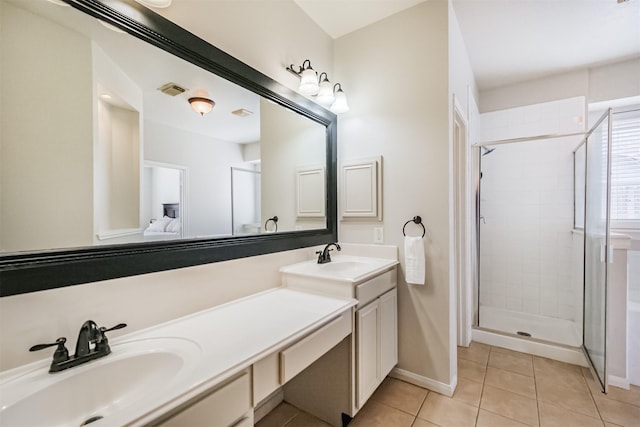 3817 Dunlavy Dr, Pearland, TX 77581 - full bathroom featuring a shower stall, double vanity, and tile patterned floors