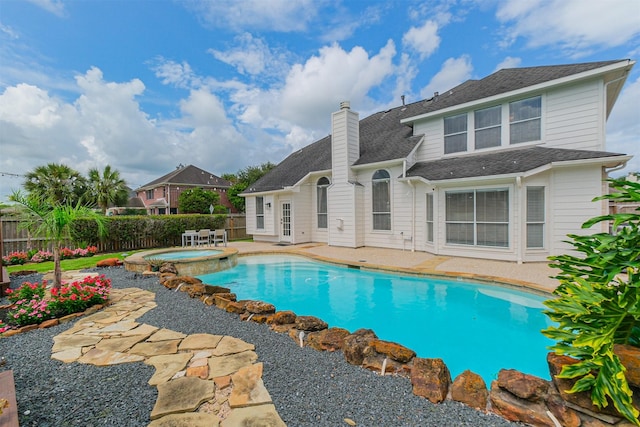 3817 Dunlavy Dr, Pearland, TX 77581 - view of pool with a patio, a fenced backyard, and a pool with connected hot tub