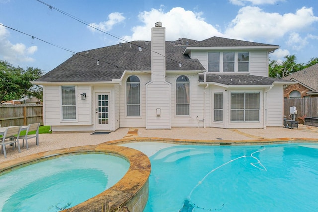 3817 Dunlavy Dr, Pearland, TX 77581 - view of pool featuring a patio area and a pool with connected hot tub