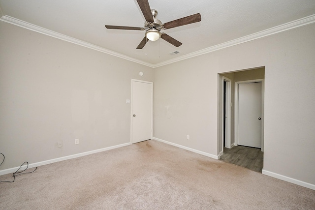 9707 Richmond Ave Unit 3, Houston, TX 77042 - empty room with light colored carpet, ornamental molding, and ceiling fan