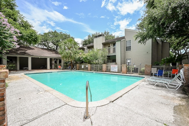 9707 Richmond Ave Unit 3, Houston, TX 77042 - community pool with a patio area