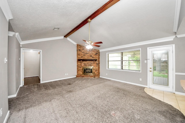 3938 Danpree St, Pasadena, TX 77504 - unfurnished living room featuring ceiling fan, carpet flooring, crown molding, a brick fireplace, and a textured ceiling