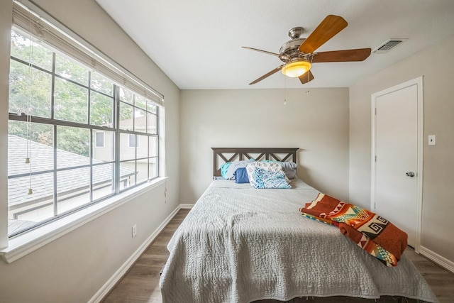 18318 Widcombe Dr, Houston, TX 77084 - bedroom with wood finished floors and ceiling fan