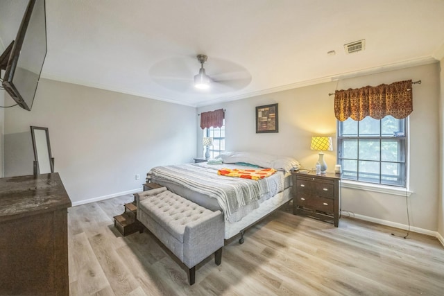 18318 Widcombe Dr, Houston, TX 77084 - bedroom featuring crown molding, light wood-type flooring, and ceiling fan