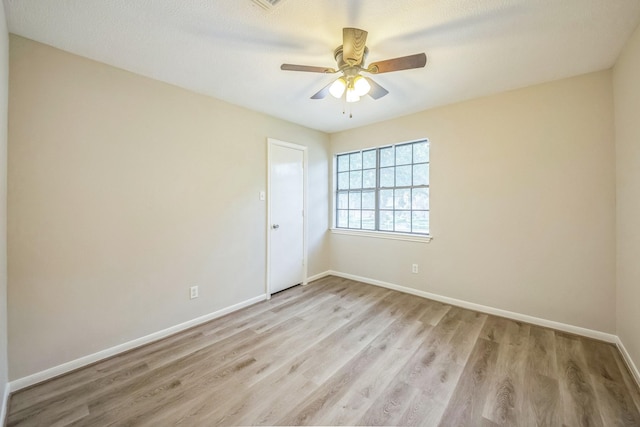 18318 Widcombe Dr, Houston, TX 77084 - spare room featuring light wood-style floors and ceiling fan