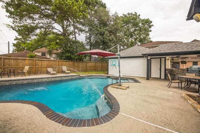 18318 Widcombe Dr, Houston, TX 77084 - view of swimming pool with a patio area