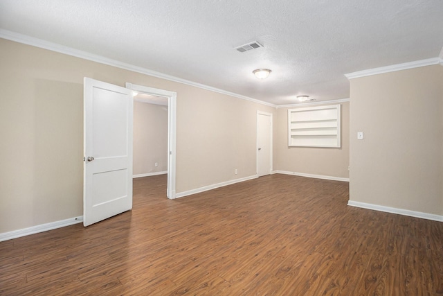 5235 Kingsbury St, Houston, TX 77021 - empty room with crown molding, dark wood finished floors, and a textured ceiling