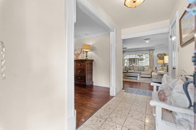 907 E Houston Ave, Crockett, TX 75835 - hallway featuring ornamental molding and baseboards