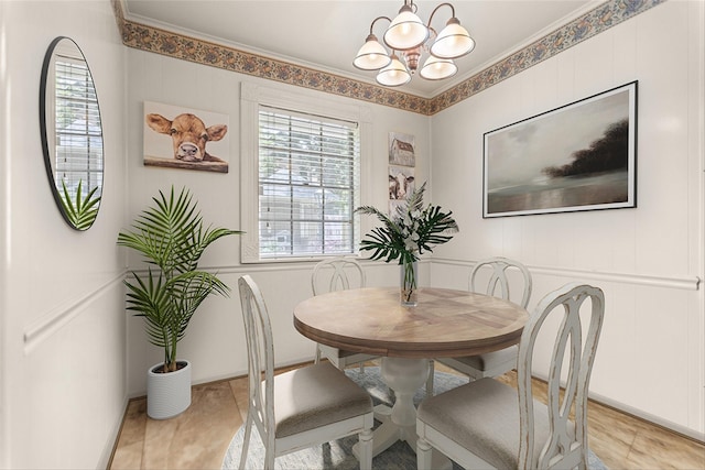 907 E Houston Ave, Crockett, TX 75835 - dining area with a chandelier, ornamental molding, and a decorative wall
