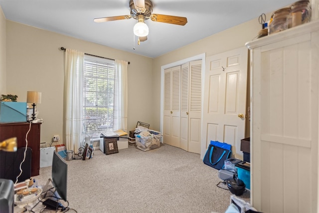 907 E Houston Ave, Crockett, TX 75835 - carpeted bedroom featuring a closet and a ceiling fan