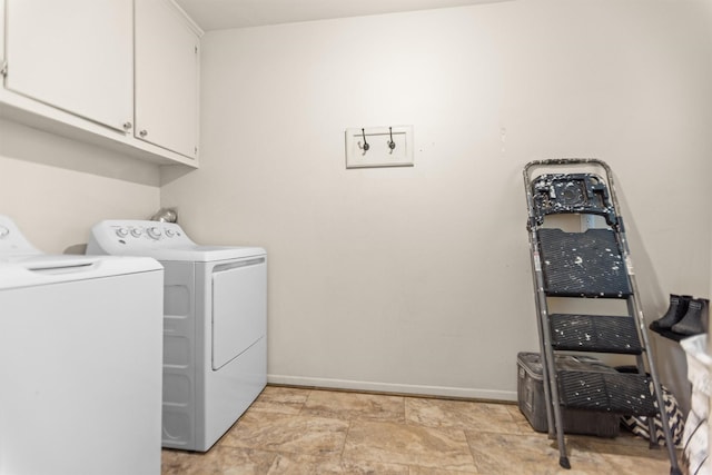 907 E Houston Ave, Crockett, TX 75835 - washroom with cabinet space and separate washer and dryer