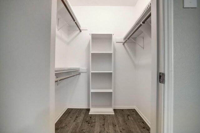 353 N Post Oak Ln Unit 819, Houston, TX 77024 - walk in closet with wood finished floors