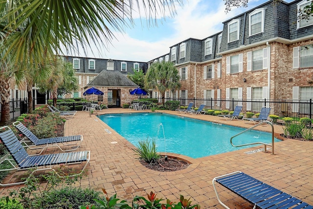 353 N Post Oak Ln Unit 819, Houston, TX 77024 - community pool with a patio area