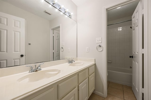 107 N Sunny Slope Cir, The Woodlands, TX 77381 - bathroom featuring double vanity, tile patterned floors, and shower / tub combination