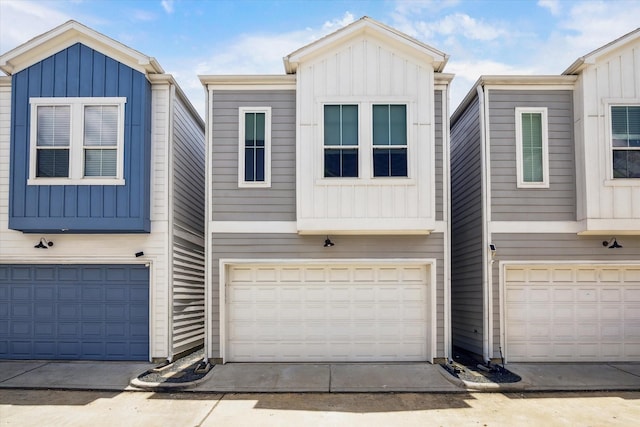 4155 Griggs Rd, Houston, TX 77021 - view of front facade featuring board and batten siding and an attached garage