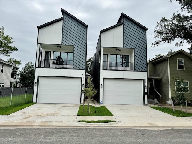 308 E 36th St, Houston, TX 77018 - modern home with a balcony, an attached garage, concrete driveway, and ceiling fan