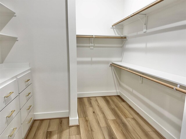 308 E 36th St, Houston, TX 77018 - walk in closet featuring light wood-style floors