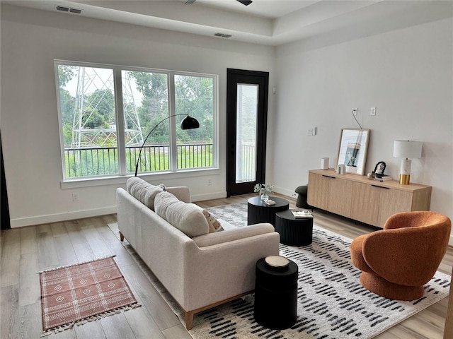 308 E 36th St, Houston, TX 77018 - living room featuring light wood-type flooring and ceiling fan