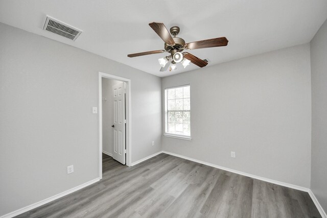 10342 Whisper Bluff Dr, Humble, TX 77396 - unfurnished room featuring wood finished floors and ceiling fan