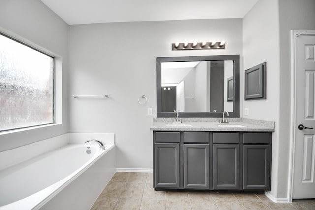 10342 Whisper Bluff Dr, Humble, TX 77396 - full bath with double vanity, a garden tub, and tile patterned flooring