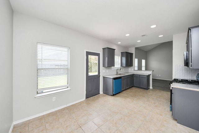 10342 Whisper Bluff Dr, Humble, TX 77396 - kitchen with dishwashing machine, tasteful backsplash, light countertops, gas stove, and recessed lighting