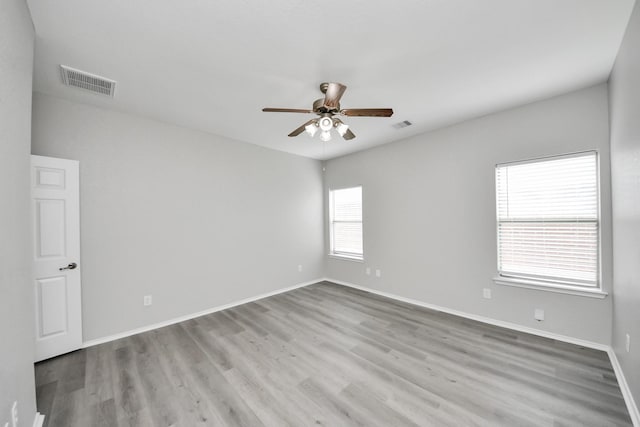 10342 Whisper Bluff Dr, Humble, TX 77396 - unfurnished room featuring ceiling fan and wood finished floors