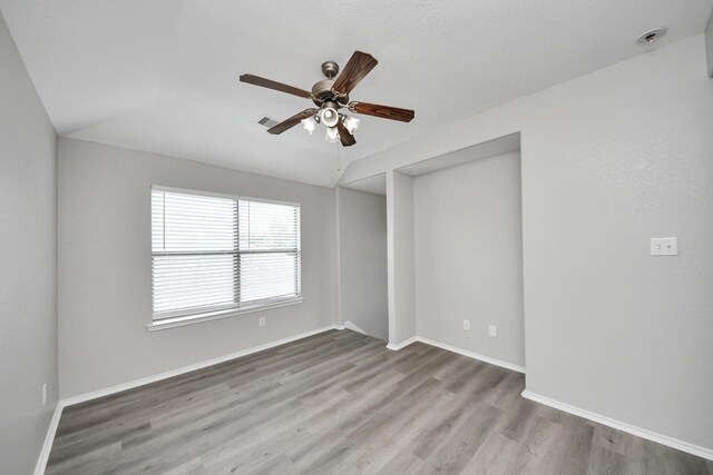 10342 Whisper Bluff Dr, Humble, TX 77396 - unfurnished room featuring a ceiling fan, wood finished floors, and a smoke detector