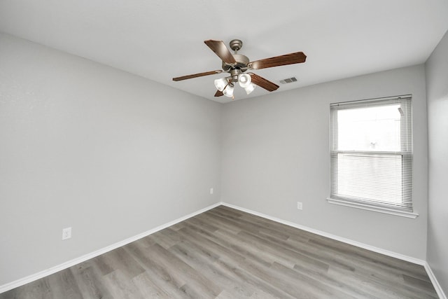 10342 Whisper Bluff Dr, Humble, TX 77396 - unfurnished room with wood finished floors and a ceiling fan