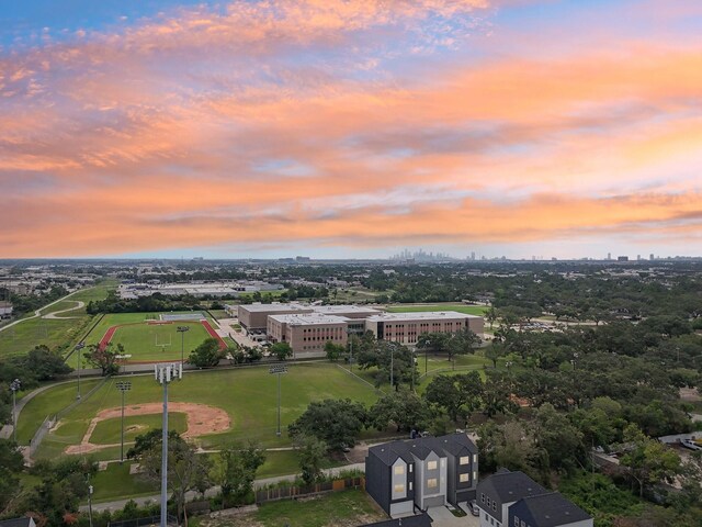 8317 Springwood Canyon Ln, Houston, TX 77055 - aerial view at dusk