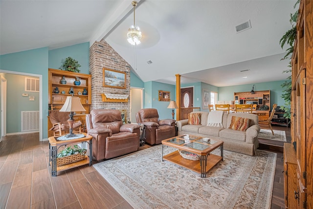 15435 Rio Plaza Dr, Houston, TX 77083 - living room with wood finished floors, a brick fireplace, and a ceiling fan