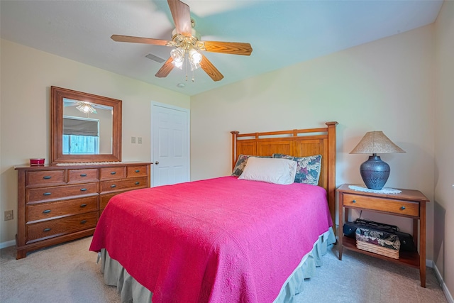 15435 Rio Plaza Dr, Houston, TX 77083 - bedroom with light carpet and a ceiling fan