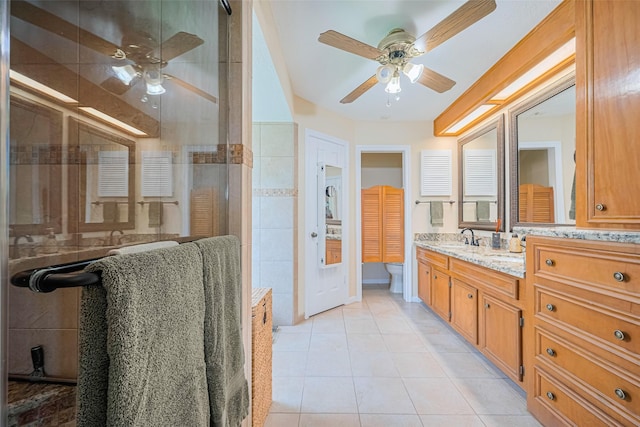 15435 Rio Plaza Dr, Houston, TX 77083 - bathroom with a ceiling fan, tile patterned flooring, vanity, and tiled shower