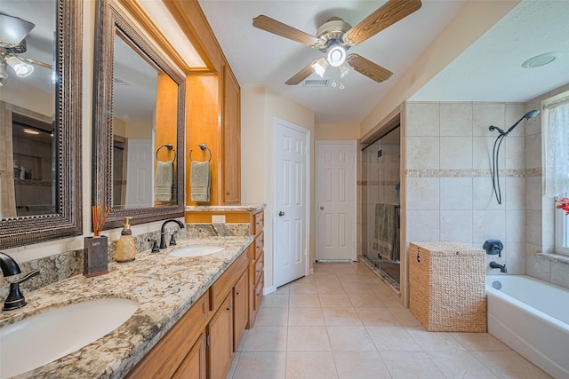 15435 Rio Plaza Dr, Houston, TX 77083 - bathroom with tiled shower, tile patterned flooring, double vanity, a bath, and a ceiling fan