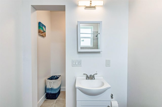 4018 6th St, Galveston, TX 77554 - bathroom with vanity and tile patterned flooring