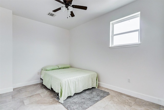 4018 6th St, Galveston, TX 77554 - bedroom with baseboards and a ceiling fan