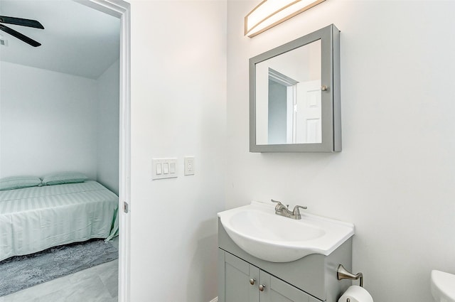 4018 6th St, Galveston, TX 77554 - bathroom featuring vanity and a ceiling fan
