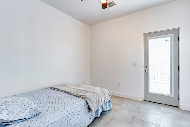 4018 6th St, Galveston, TX 77554 - bedroom featuring light tile patterned floors and ceiling fan