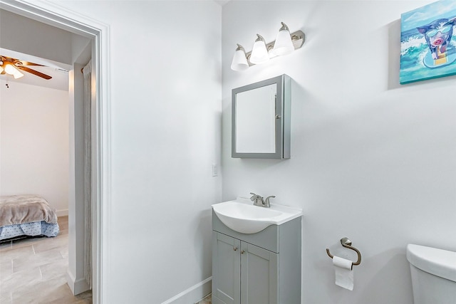 4018 6th St, Galveston, TX 77554 - bathroom featuring vanity and ceiling fan