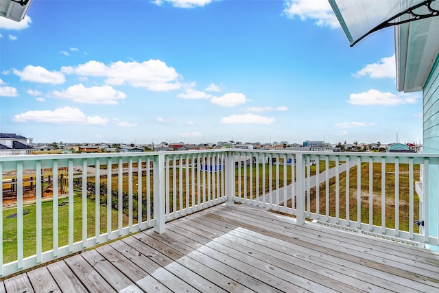4018 6th St, Galveston, TX 77554 - wooden deck with a yard