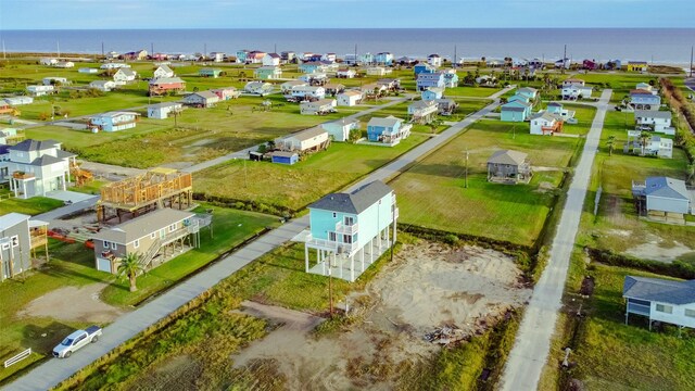 4018 6th St, Galveston, TX 77554 - aerial view of residential area with a large body of water