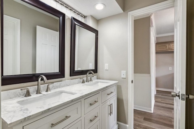 4710 N Cashel Cir, Houston, TX 77069 - bathroom featuring double vanity and wood finished floors