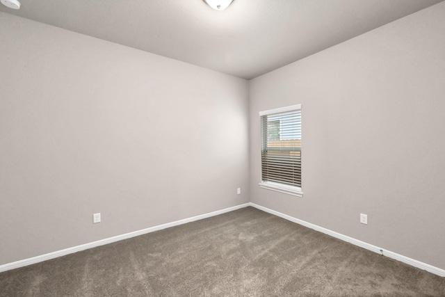 5096 Marcasca Dr, Katy, TX 77493 - empty room with dark colored carpet and baseboards